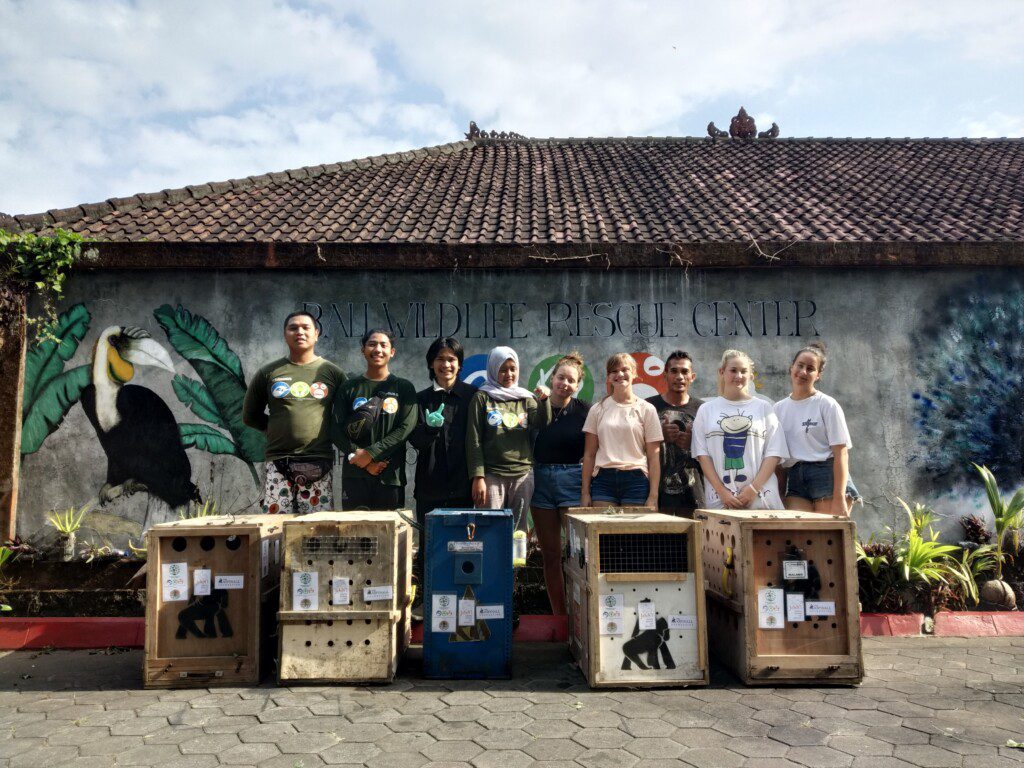 Students helping at Friends of Nature, People and Forest's Bali Wildlife Rescue Center