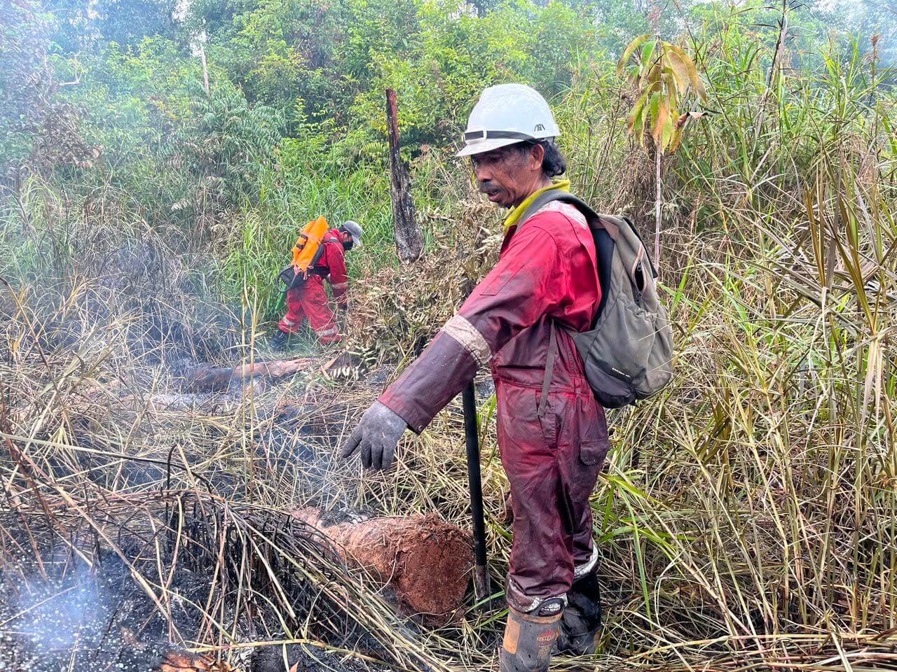 FNPF firefighter in protective clothing responding to the Jerumbun forest fire in Central Kalimantan